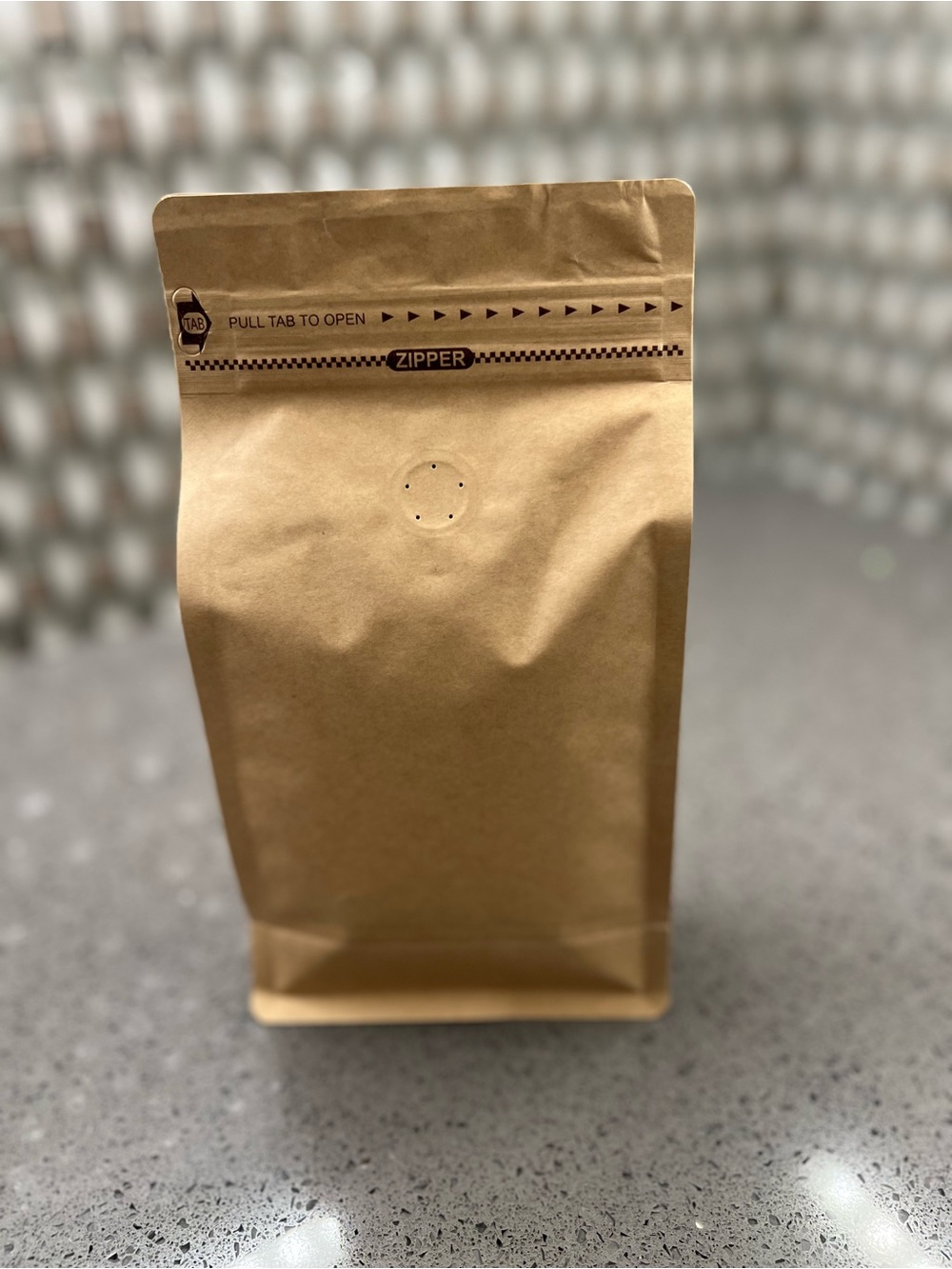 New package of medium roasted Starbucks coffee beans 9”x5”x3”